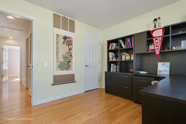 home office featuring light hardwood / wood-style floors