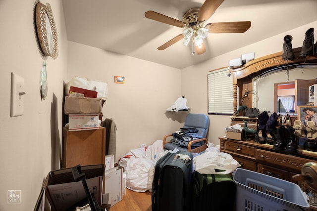 interior space with ceiling fan and light wood-type flooring