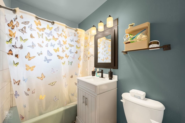 full bathroom featuring shower / bath combo, vanity, and toilet