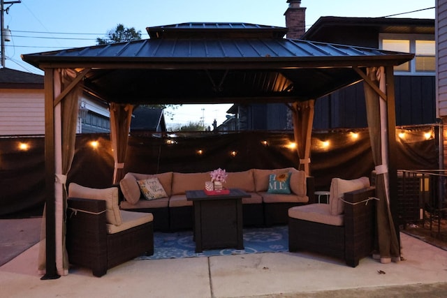 view of patio featuring a gazebo and an outdoor hangout area