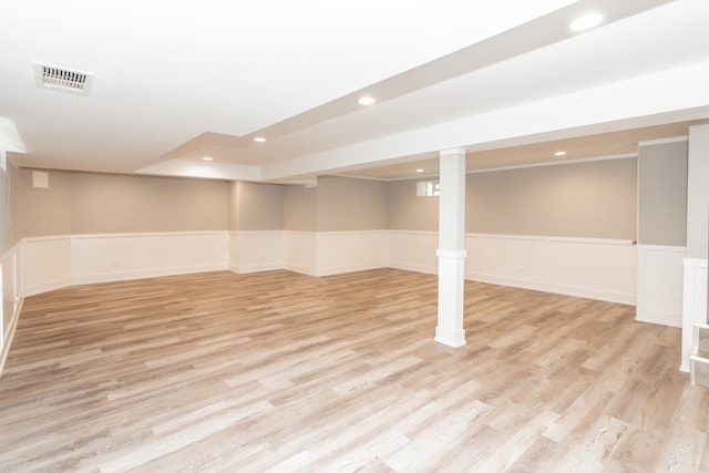 basement featuring light wood-type flooring