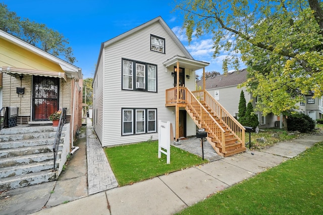 view of front of house with a front lawn