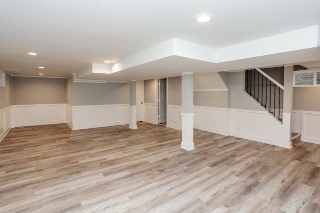 basement featuring light wood-type flooring