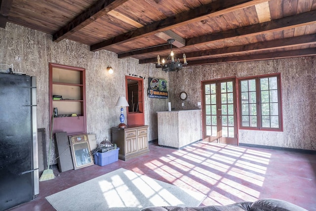 2206 W Lunt Ave, Chicago, IL 60645 - unfurnished living room featuring french doors, wood ceiling with exposed beams, concrete floors, and a chandelier