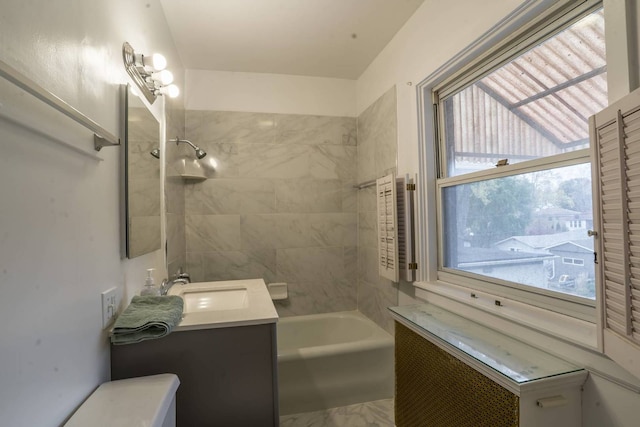 2206 W Lunt Ave, Chicago, IL 60645 - full bath featuring shower / tub combination, vanity, toilet, and marble finish floors
