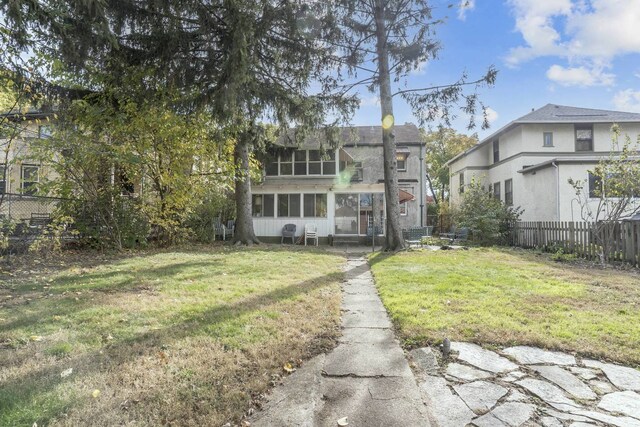 2206 W Lunt Ave, Chicago, IL 60645 - back of property with a sunroom