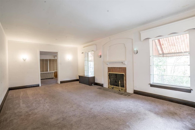 2206 W Lunt Ave, Chicago, IL 60645 - unfurnished living room featuring carpet flooring, radiator, a fireplace with flush hearth, and baseboards