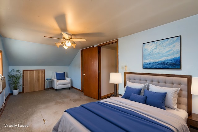 bedroom with lofted ceiling and ceiling fan