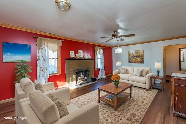 living room featuring ornamental molding, a wealth of natural light, hardwood / wood-style flooring, and ceiling fan