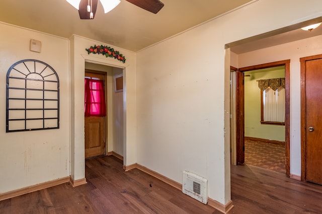 spare room featuring ceiling fan, crown molding, and dark hardwood / wood-style flooring