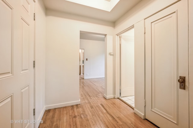 hallway featuring light hardwood / wood-style flooring