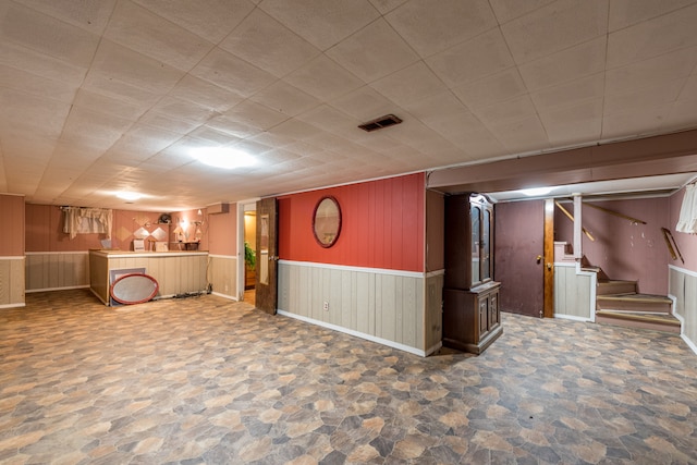 basement with wooden walls