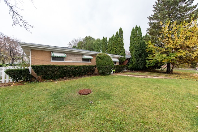 view of front of house featuring a front yard