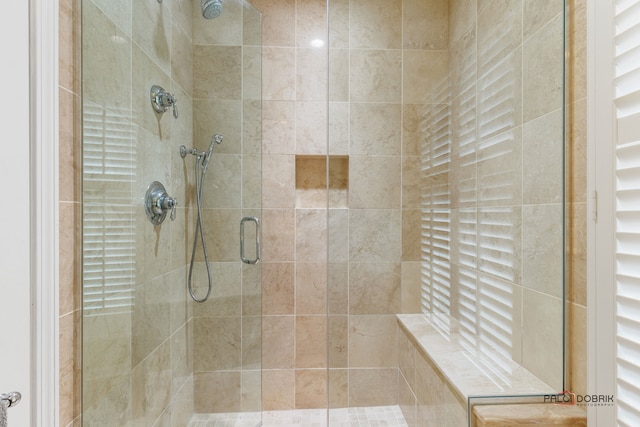 bathroom featuring walk in shower