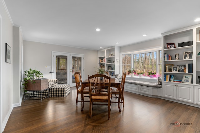 dining area featuring french doors, plenty of natural light, dark hardwood / wood-style floors, and ornamental molding