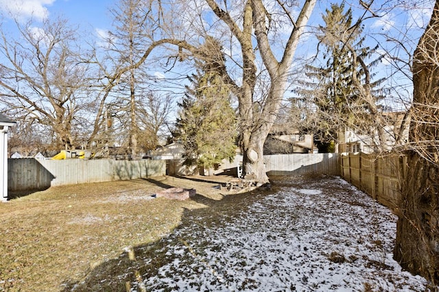 view of yard covered in snow