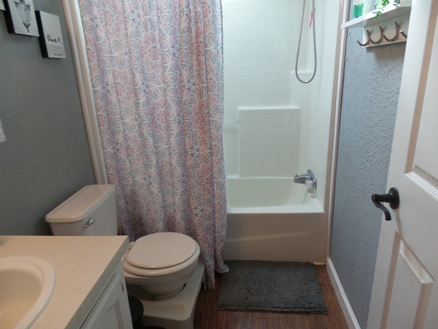 full bathroom featuring hardwood / wood-style flooring, vanity, toilet, and shower / bath combo