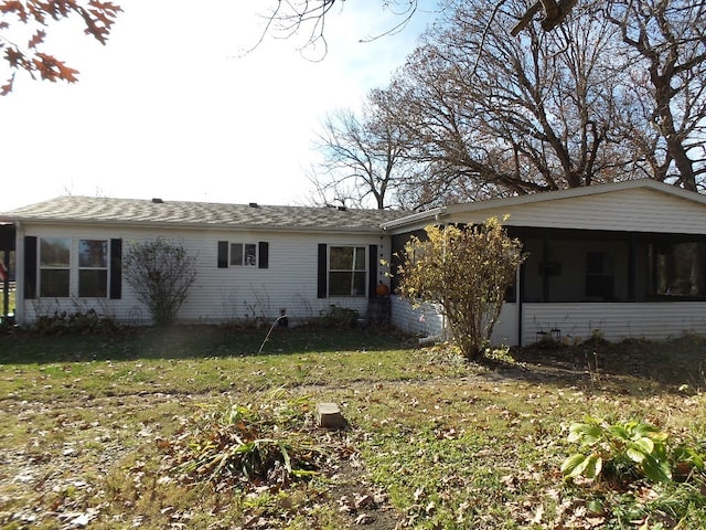 exterior space featuring a lawn