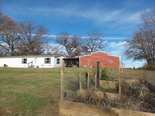 view of yard with a carport