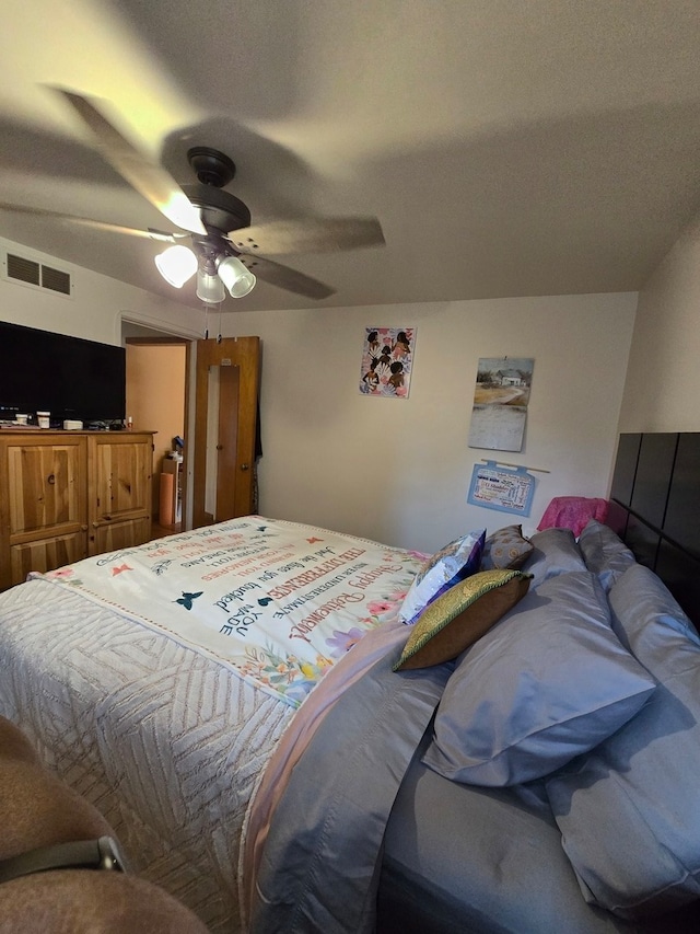 bedroom featuring ceiling fan