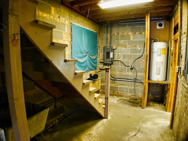 basement with water heater and electric panel