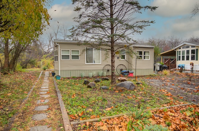 exterior space featuring a carport