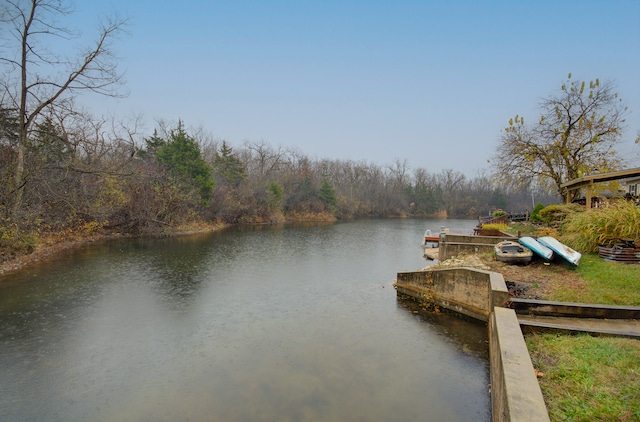 view of dock with a water view