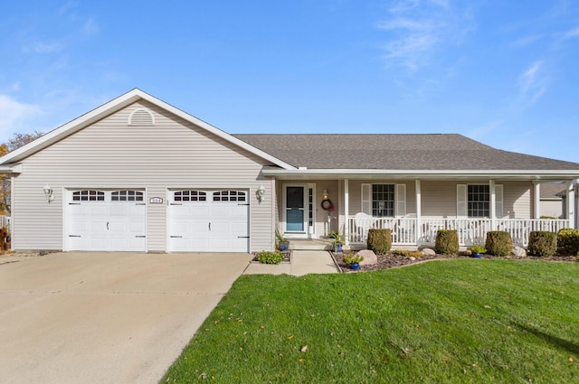 ranch-style home featuring covered porch, a garage, and a front lawn