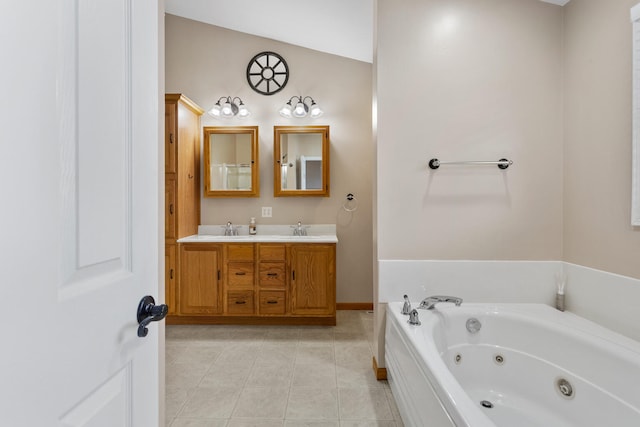 bathroom featuring a tub to relax in, tile patterned flooring, vanity, and lofted ceiling