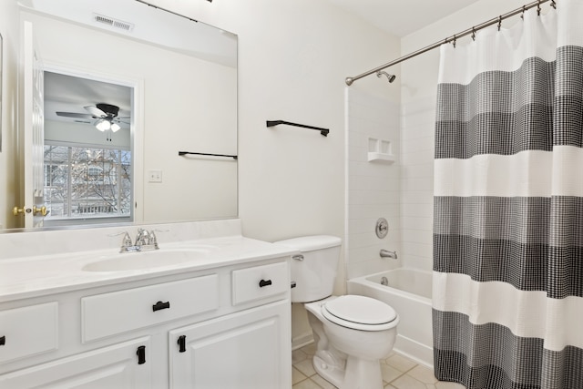 full bathroom with vanity, tile patterned flooring, ceiling fan, toilet, and shower / tub combo