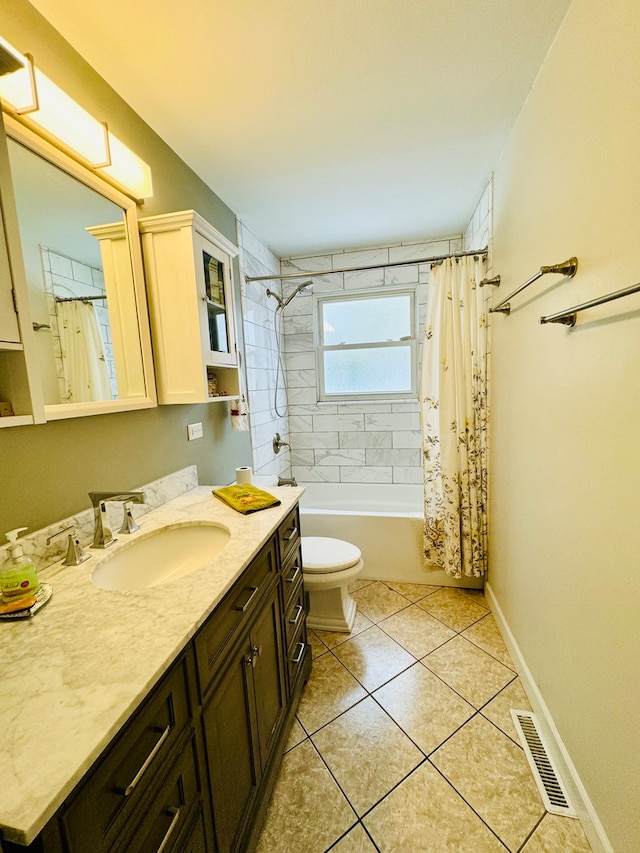 full bathroom with vanity, tile patterned flooring, shower / bath combo, and toilet