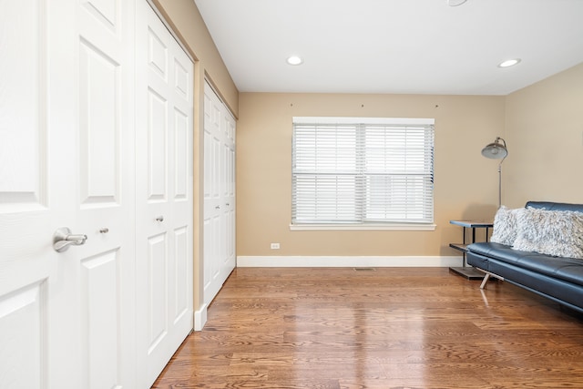 sitting room featuring hardwood / wood-style flooring