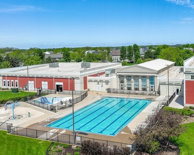 view of swimming pool with central AC and a patio area