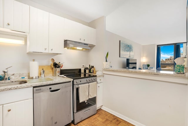 kitchen with white cabinets, sink, stainless steel appliances, and light parquet flooring