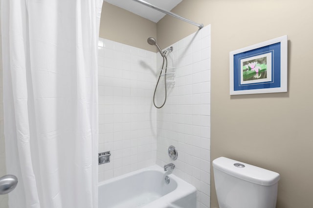 full bathroom featuring toilet and shower / bathtub combination with curtain