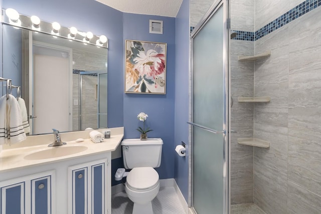 full bath with visible vents, toilet, a shower stall, vanity, and baseboards