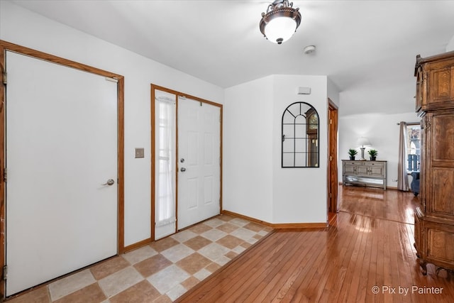 foyer entrance featuring light hardwood / wood-style flooring