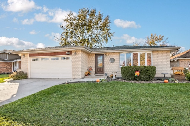 single story home featuring a garage and a front yard