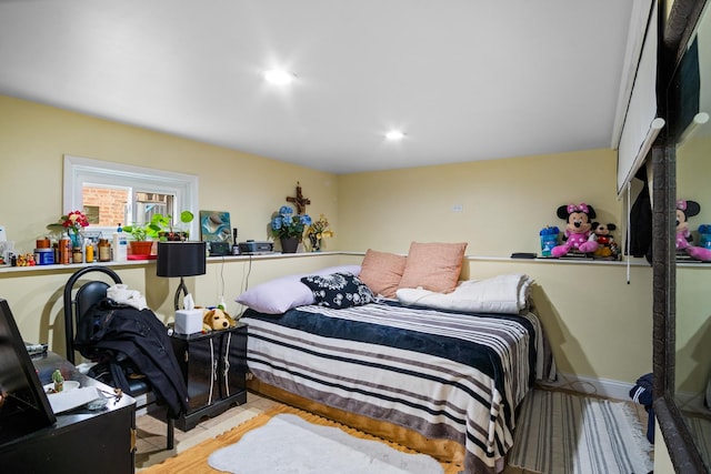 bedroom featuring light wood-type flooring