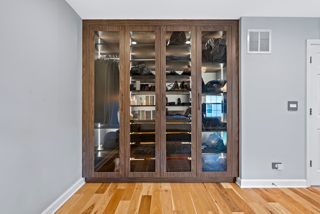 interior details featuring wood-type flooring