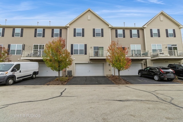 multi unit property with a garage and central AC