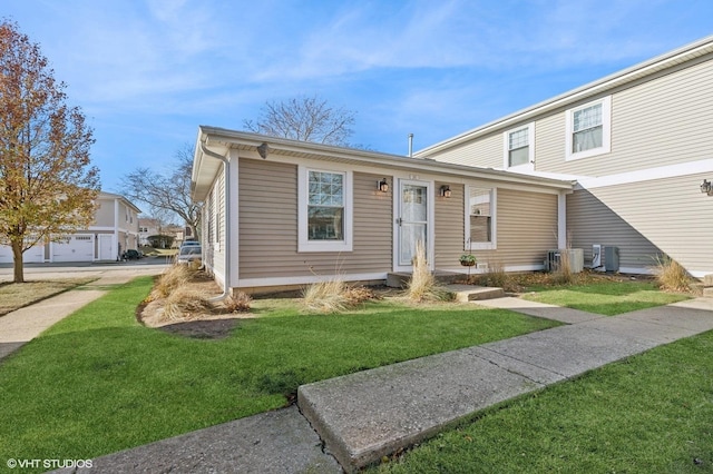 view of front of home with a front lawn