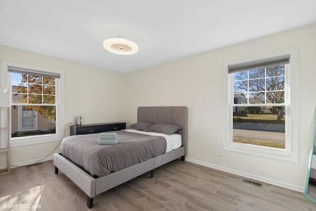 bedroom featuring hardwood / wood-style flooring