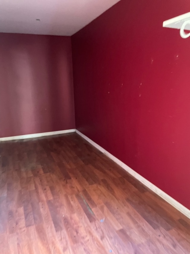 spare room featuring hardwood / wood-style floors