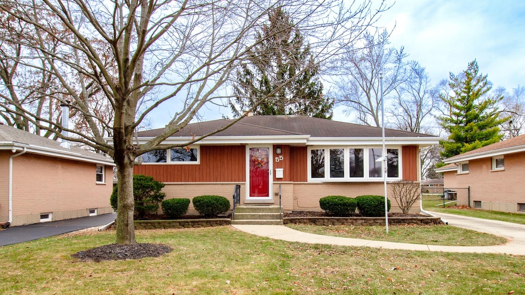 view of front of home with a front yard