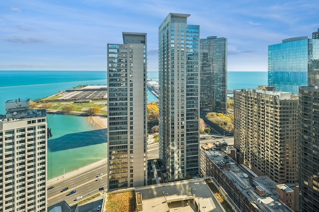 property's view of city featuring a water view