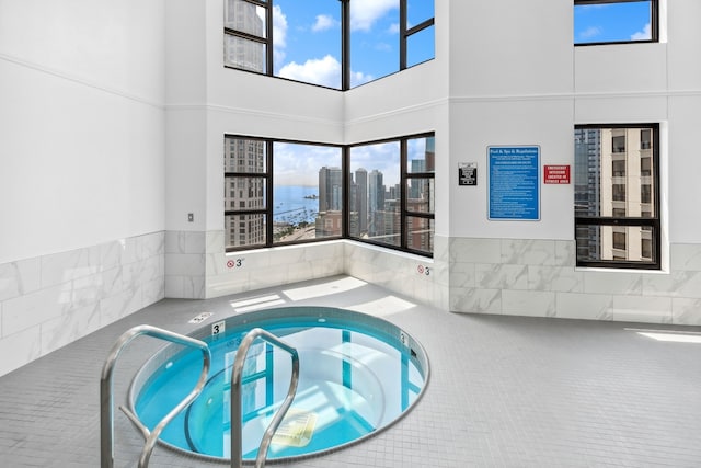 view of pool featuring an indoor in ground hot tub