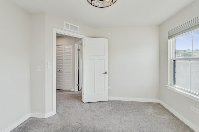 view of carpeted spare room