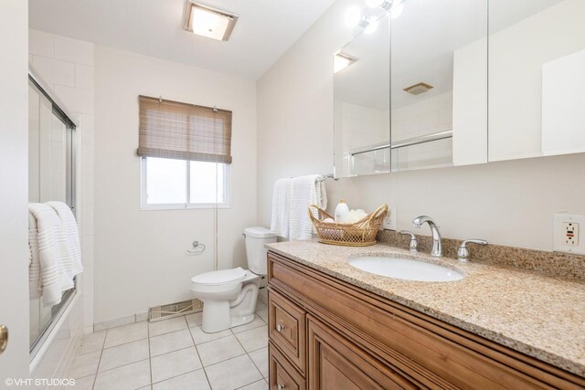 spare room with baseboard heating, dark wood-type flooring, and ceiling fan