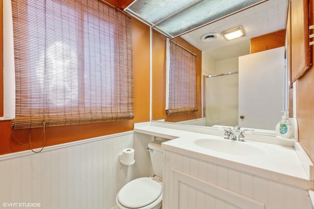 full bathroom featuring vanity, toilet, shower / bath combination with glass door, and tile patterned flooring